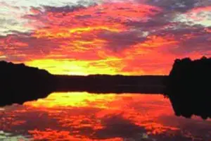 Beatiful yellow, red and burnt orange sunset over Patoka Lake.