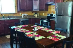 Kitchen with table in cabin