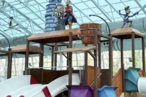 Slide hub with characters on top at Big Splash Adventure