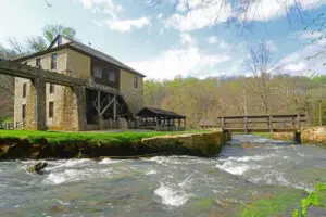 Mill at spring mill park with creek in forground
