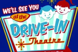 Retro sign that says We'll see you at the Drive-in Theatre snack bar