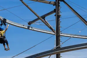 A person flying along the Bat Chaser rail.