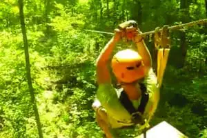 Someone getting ready to take off on a zipline trip