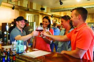 Two couples toasting at Patoka Lake Winery