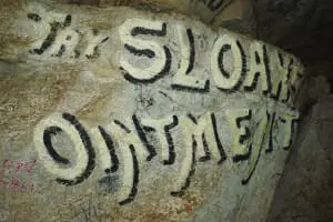 Wyandotte7 Advertisement, Try Sloan Ointment, painted on rock wall in Wyandotte Cave