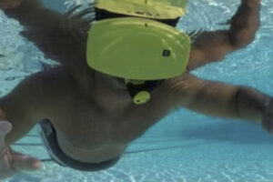 Young swimmer with Underwater Virtual Reality goggles on in the DIVR experience at Big Splash Adventure.