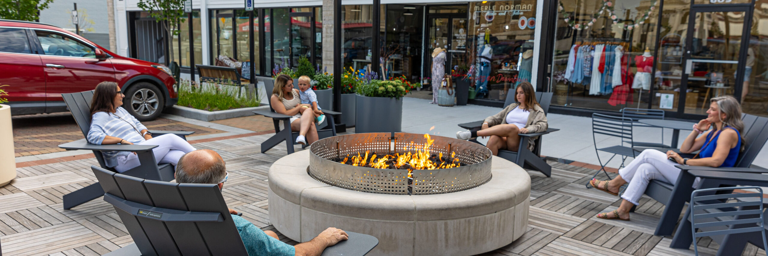 Seating area with fire pit outside of a shopping district in Jasper IN