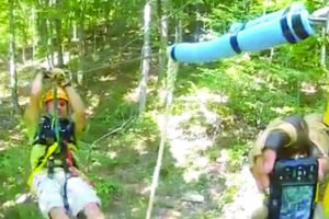 Guy approaching the landing platform after a zipline trip at SBC Zipline Adventure