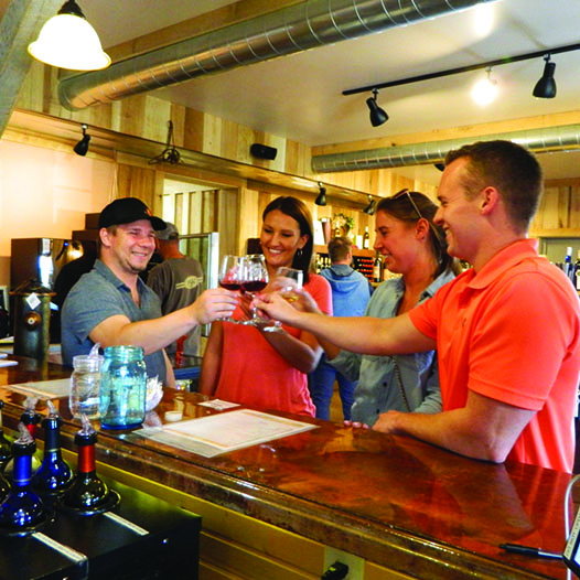 Winecheers Two couples toasting at Patoka Lake Winery