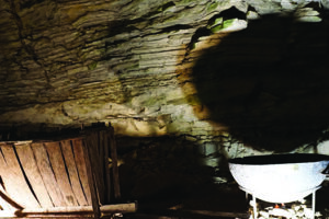 Seat and cooking pot left over from cave tenants at Wyandotte Cave