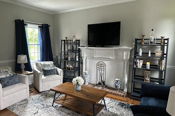 Ross Mansion interior. Showing the parlor area with comfortable seating area. This newly restored historic home is the perfect specialty lodging in Southern Indiana